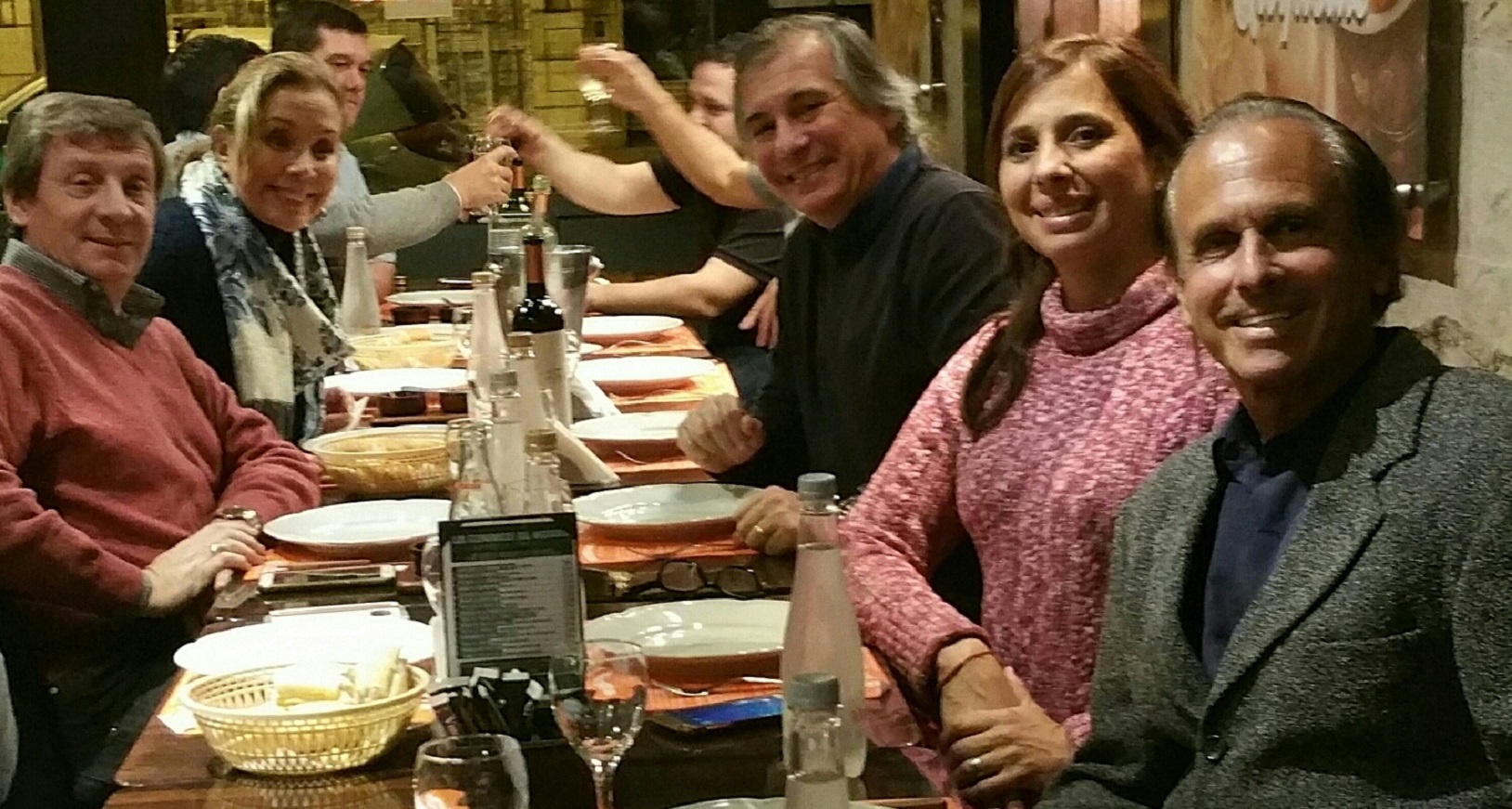 Having fun at a casual group dinner in Rosario Argentina